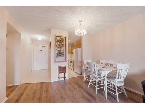 206-2206 Hawksbrow Point Nw, Calgary, AB - Indoor Photo Showing Dining Room