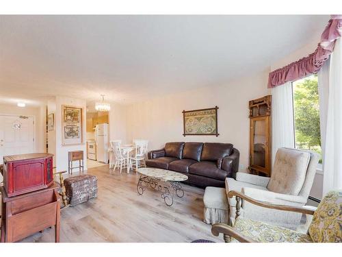 206-2206 Hawksbrow Point Nw, Calgary, AB - Indoor Photo Showing Living Room