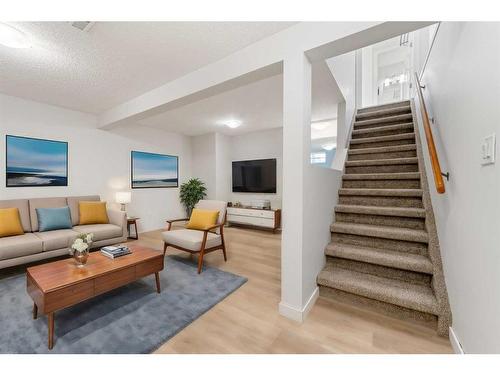 15 Falshire Place Ne, Calgary, AB - Indoor Photo Showing Living Room