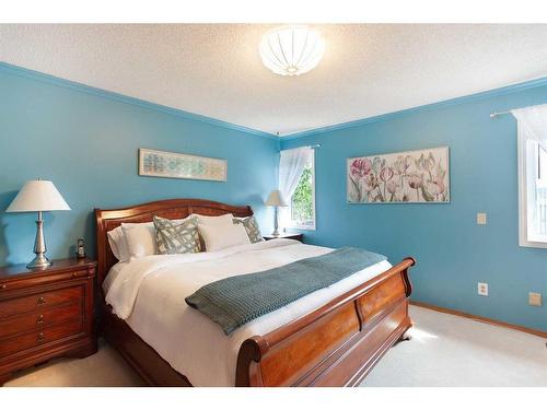 57 Shannon Crescent Sw, Calgary, AB - Indoor Photo Showing Bedroom