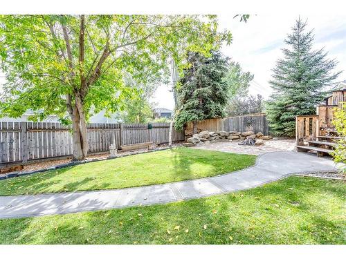 57 Shannon Crescent Sw, Calgary, AB - Outdoor With Backyard