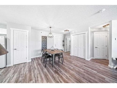 1308-1818 Simcoe Boulevard Sw, Calgary, AB - Indoor Photo Showing Dining Room