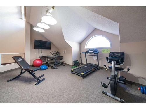 1308-1818 Simcoe Boulevard Sw, Calgary, AB - Indoor Photo Showing Gym Room