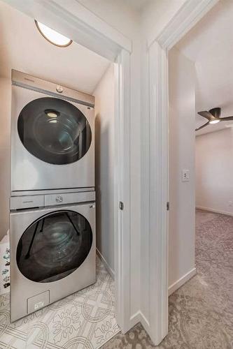 263 Aquila Way Nw, Calgary, AB - Indoor Photo Showing Laundry Room