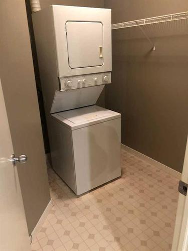 1-601 15 Avenue Sw, Calgary, AB - Indoor Photo Showing Laundry Room