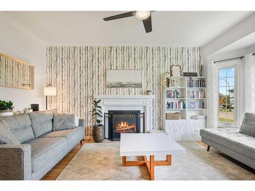 2 Chism Close, Red Deer, AB - Indoor Photo Showing Living Room With Fireplace