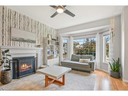 2 Chism Close, Red Deer, AB - Indoor Photo Showing Living Room With Fireplace