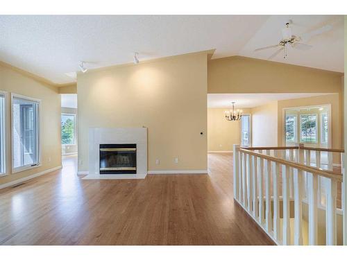 36 Sunrise Way, Priddis Greens, AB - Indoor With Fireplace