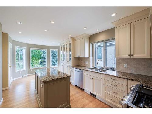 36 Sunrise Way, Priddis Greens, AB - Indoor Photo Showing Kitchen With Double Sink With Upgraded Kitchen