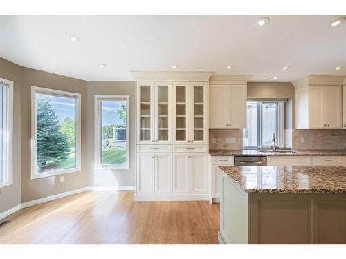 36 Sunrise Way, Priddis Greens, AB - Indoor Photo Showing Kitchen With Double Sink