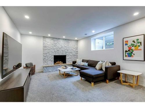 1211 Lansdowne Avenue Sw, Calgary, AB - Indoor Photo Showing Other Room With Fireplace