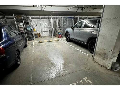 2109-215 Legacy Boulevard Se, Calgary, AB - Indoor Photo Showing Garage