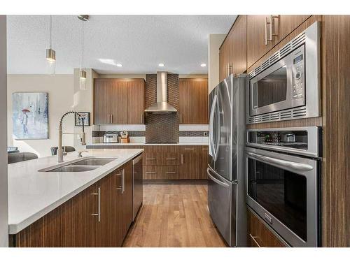 249 Walden Heights Se, Calgary, AB - Indoor Photo Showing Kitchen With Double Sink With Upgraded Kitchen