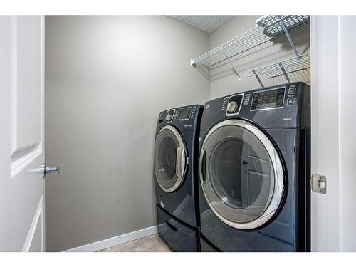 249 Walden Heights Se, Calgary, AB - Indoor Photo Showing Laundry Room