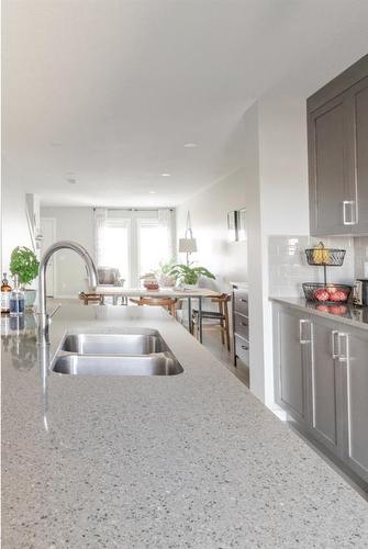 19458 37 Street Se, Calgary, AB - Indoor Photo Showing Kitchen With Double Sink