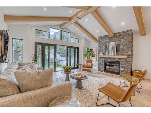 1 (Ne)-833 6Th Street, Canmore, AB - Indoor Photo Showing Living Room With Fireplace