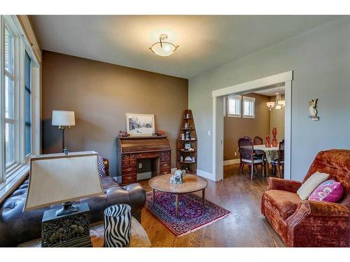 220 18A Street Nw, Calgary, AB - Indoor Photo Showing Living Room With Fireplace