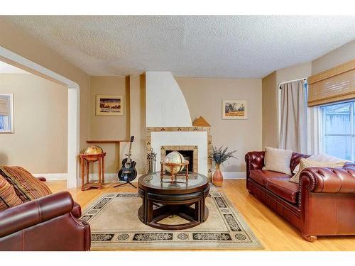 1811 27 Avenue Sw, Calgary, AB - Indoor Photo Showing Living Room With Fireplace