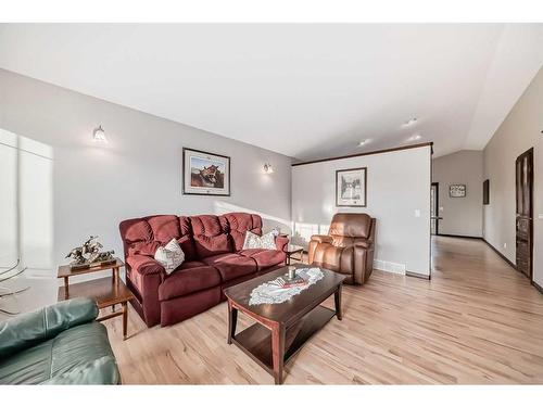 108 Sunset Heights, Crossfield, AB - Indoor Photo Showing Living Room