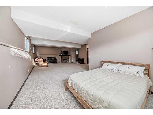 108 Sunset Heights, Crossfield, AB - Indoor Photo Showing Bedroom