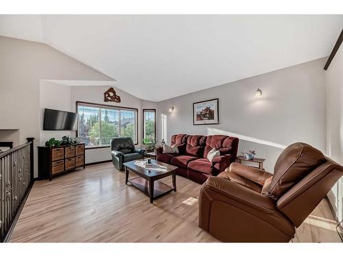 108 Sunset Heights, Crossfield, AB - Indoor Photo Showing Living Room