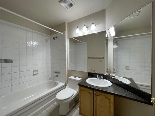 56 Coachway Gardens Sw, Calgary, AB - Indoor Photo Showing Bathroom