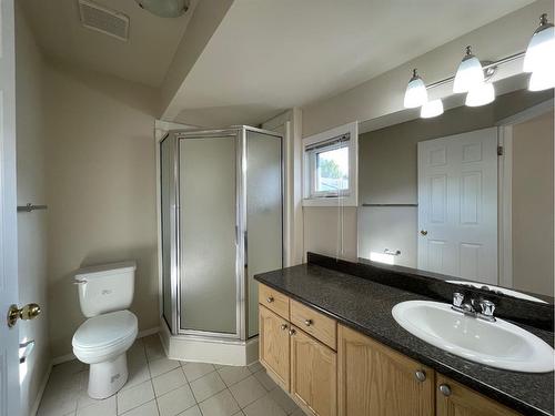 56 Coachway Gardens Sw, Calgary, AB - Indoor Photo Showing Bathroom