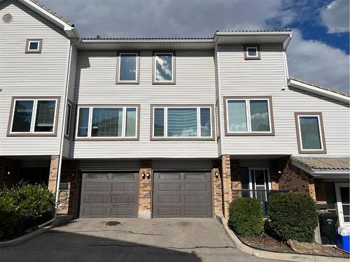 56 Coachway Gardens Sw, Calgary, AB - Outdoor With Facade