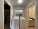 56 Coachway Gardens Sw, Calgary, AB  - Indoor Photo Showing Laundry Room 