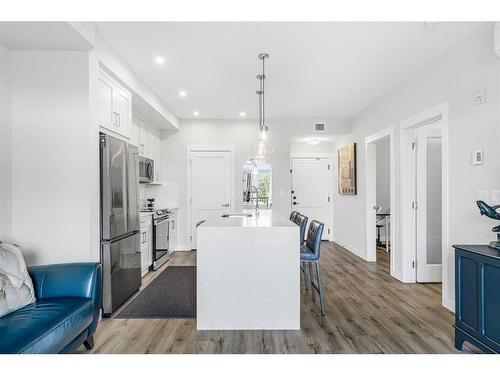 4210-200 Seton Circle Se, Calgary, AB - Indoor Photo Showing Kitchen With Stainless Steel Kitchen With Upgraded Kitchen