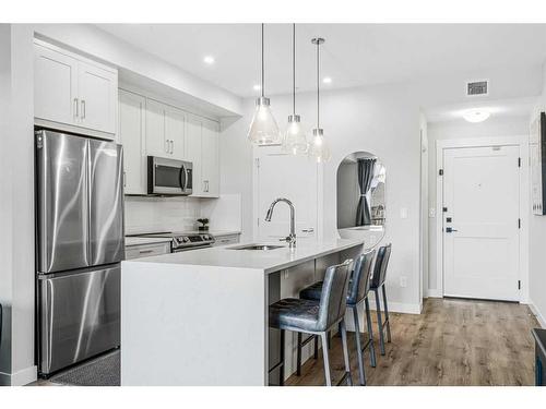 4210-200 Seton Circle Se, Calgary, AB - Indoor Photo Showing Kitchen With Stainless Steel Kitchen With Upgraded Kitchen