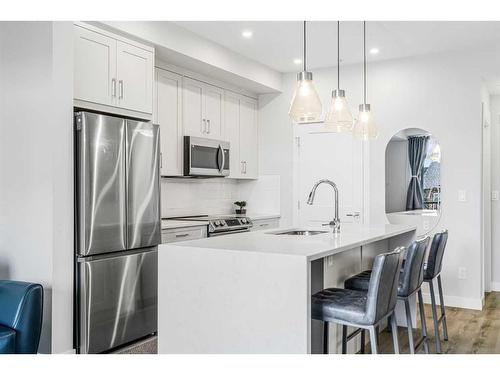 4210-200 Seton Circle Se, Calgary, AB - Indoor Photo Showing Kitchen With Stainless Steel Kitchen With Upgraded Kitchen