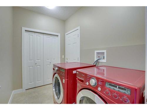 15 Sunset Close, Cochrane, AB - Indoor Photo Showing Laundry Room