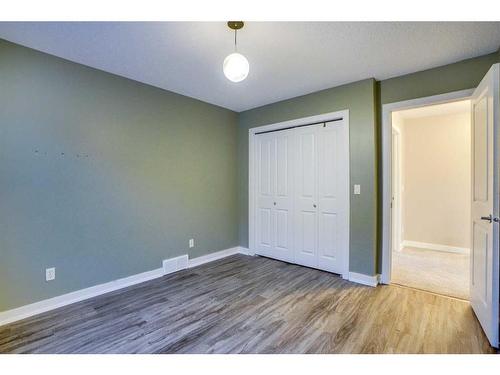 15 Sunset Close, Cochrane, AB - Indoor Photo Showing Other Room