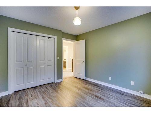 15 Sunset Close, Cochrane, AB - Indoor Photo Showing Other Room