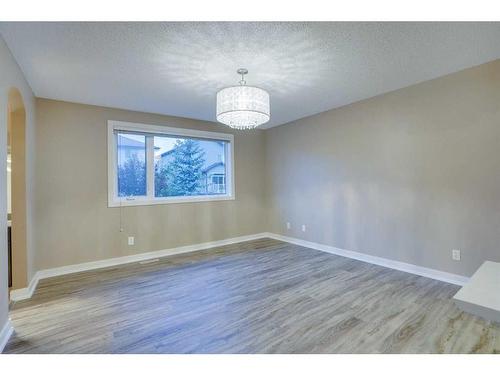 15 Sunset Close, Cochrane, AB - Indoor Photo Showing Other Room