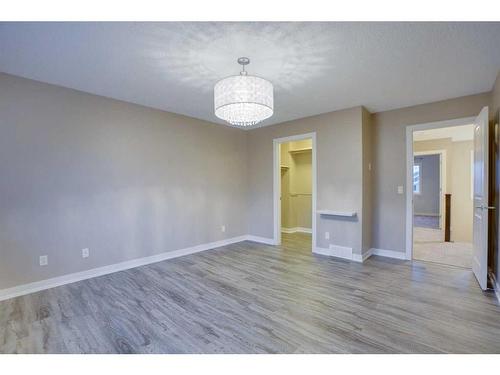 15 Sunset Close, Cochrane, AB - Indoor Photo Showing Other Room