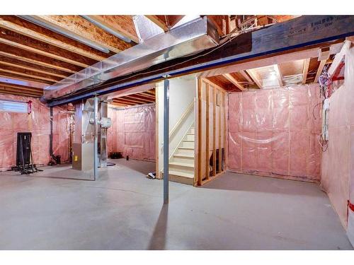 15 Sunset Close, Cochrane, AB - Indoor Photo Showing Basement