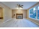 15 Sunset Close, Cochrane, AB  - Indoor Photo Showing Living Room With Fireplace 