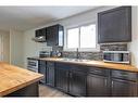 7419 21A Street Se, Calgary, AB  - Indoor Photo Showing Kitchen With Double Sink 