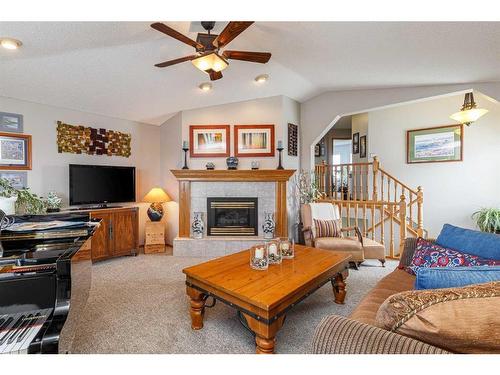 134 Tuscarora Close Nw, Calgary, AB - Indoor Photo Showing Living Room With Fireplace