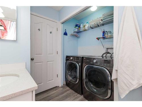 134 Tuscarora Close Nw, Calgary, AB - Indoor Photo Showing Laundry Room