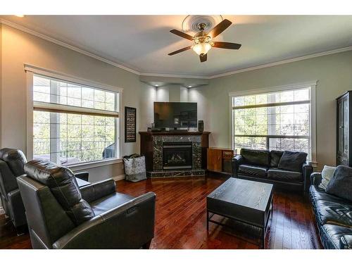 106 Simcoe Crescent Sw, Calgary, AB - Indoor Photo Showing Living Room With Fireplace