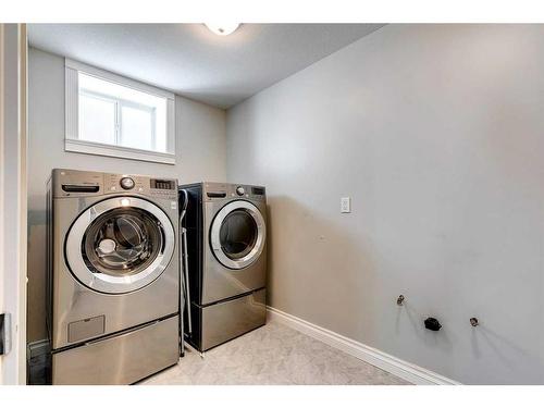 106 Simcoe Crescent Sw, Calgary, AB - Indoor Photo Showing Laundry Room