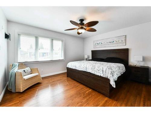 1267 Lake Sundance Crescent Se, Calgary, AB - Indoor Photo Showing Bedroom