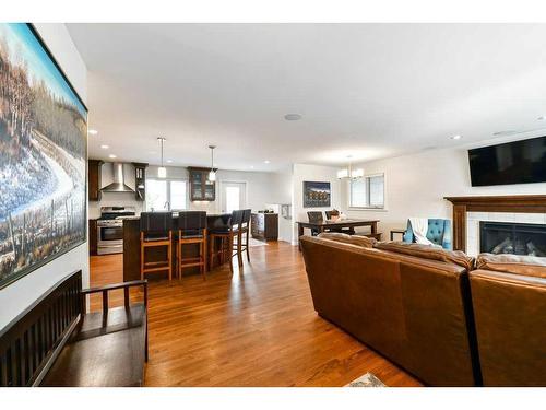 1267 Lake Sundance Crescent Se, Calgary, AB - Indoor Photo Showing Living Room With Fireplace