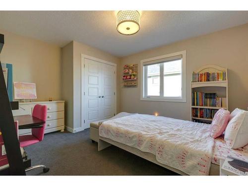 165 Aspen Summit Circle Sw, Calgary, AB - Indoor Photo Showing Bedroom