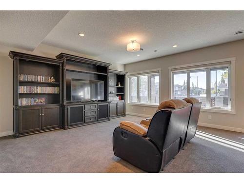 165 Aspen Summit Circle Sw, Calgary, AB - Indoor Photo Showing Living Room