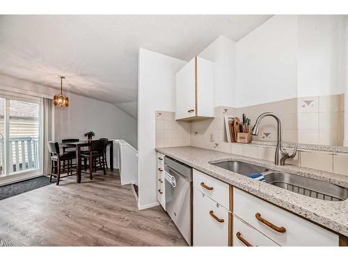 193 Taradale Drive Ne, Calgary, AB - Indoor Photo Showing Kitchen With Double Sink