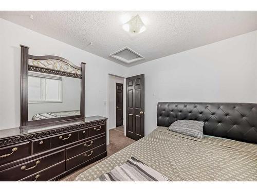 193 Taradale Drive Ne, Calgary, AB - Indoor Photo Showing Bedroom